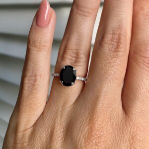 Elegant Black Onyx Silver Solitaire Ring with Crystal Accents